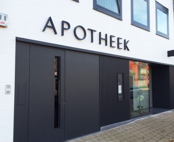 Alinel gevelbekleding type a realisatie apotheek Brugge